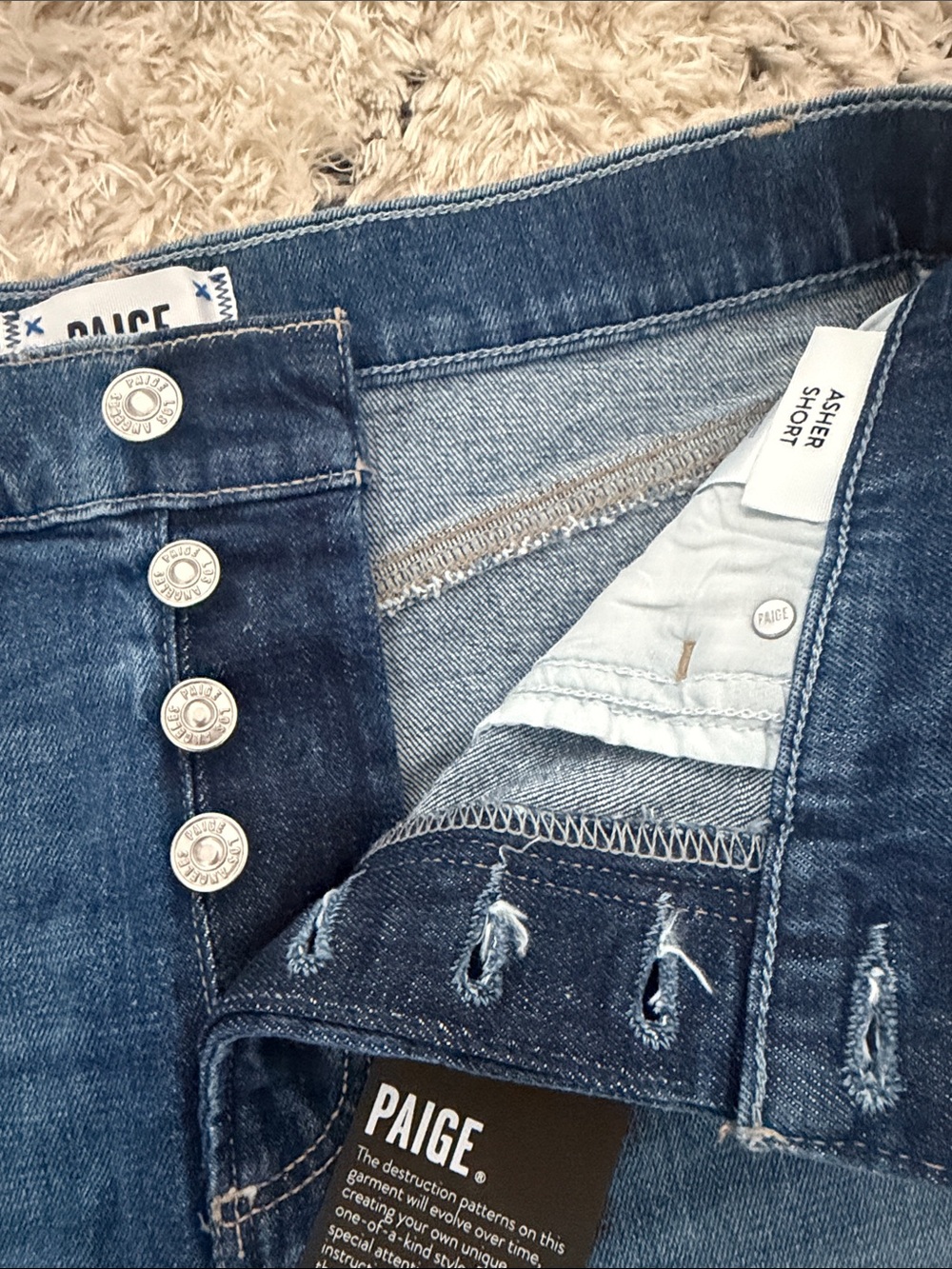 PAIGE Medium Wash Frayed Hem Denim Shorts - Picture 3 of 6